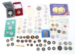 A collection of assorted coins. Including 15 enamelled coins and other assorted coins.