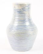 A Moorcroft blue ribbed lamp base, in lustrous finish.