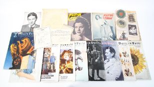 A collection of WWII Third Reich women's magazines and books.