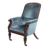 A Victorian upholstered library chair.