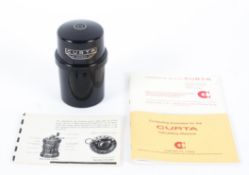 A Curta Mark 11 Calculator Serial No 539610. With associated case and instructions.