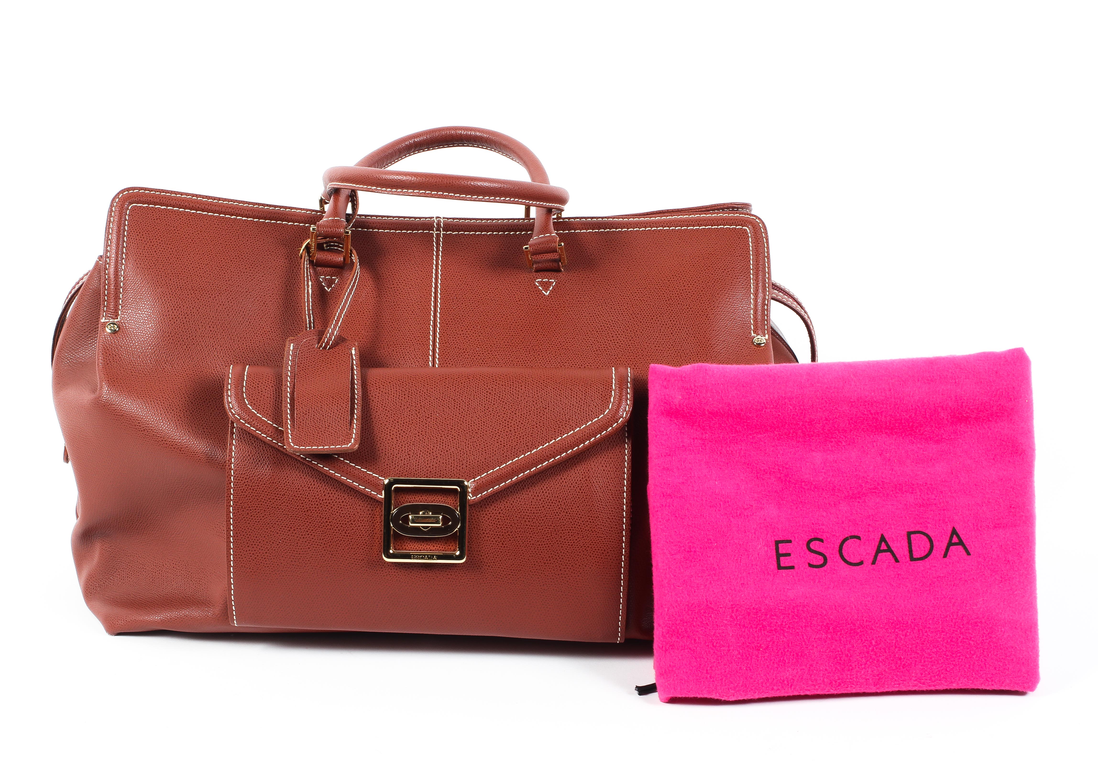 An Escade burgundy leather travel bag and dust bag Condition Report: Overall in good - Image 4 of 6