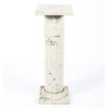 A composite marblised pedestal column.