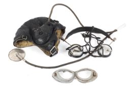 Flying helmet and headphones, voice tube, goggles belonging to Sargent Prater 501 squadron.