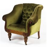 A circa 1820 century mahogany framed and upholstered gentlemans armchair