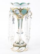 A Victorian cased glass and enamelled lustre of large size.