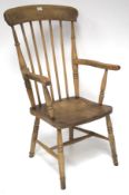 An elm Windsor armchair.