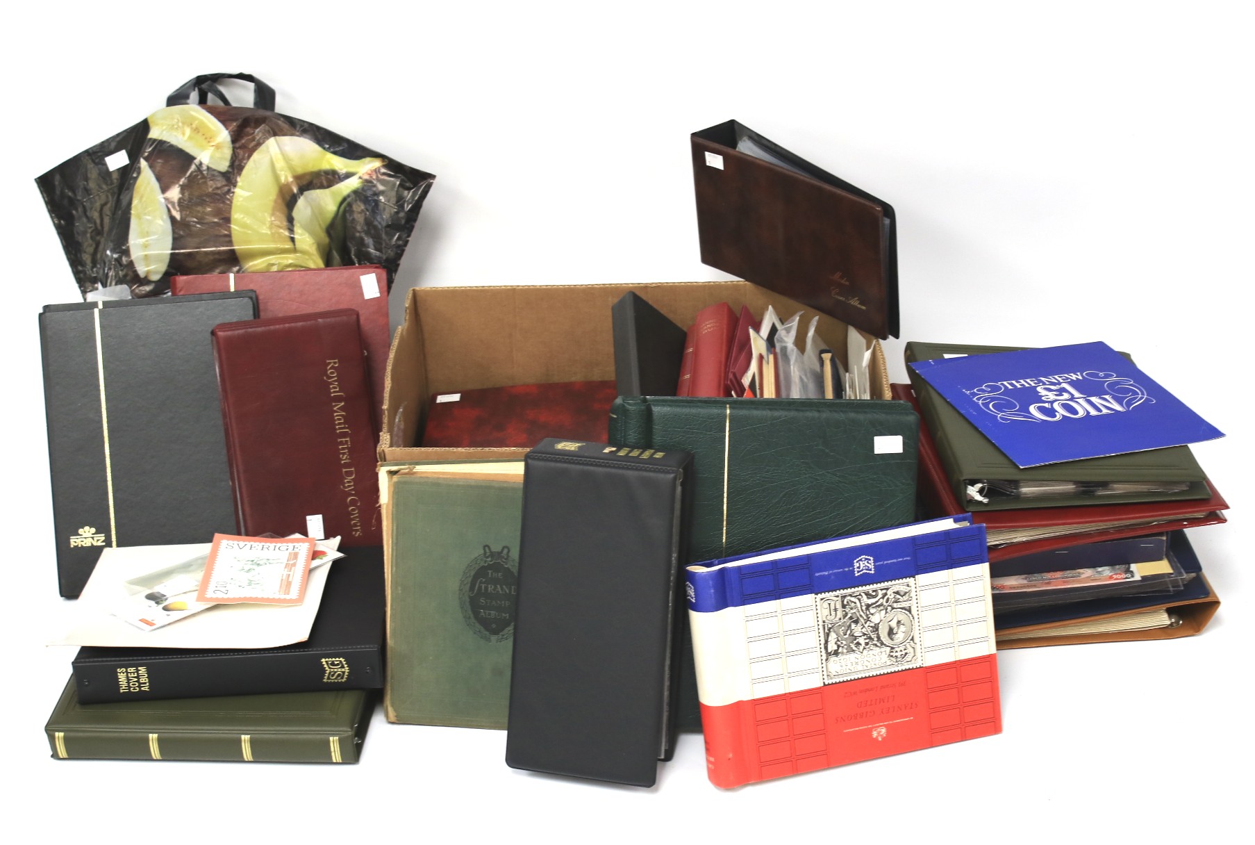 A large collection of World Stamps and stamp albums.