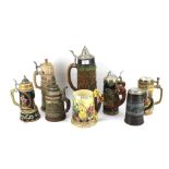 An assortment of German stoneware steins.