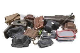 A collection of leather camera cases.