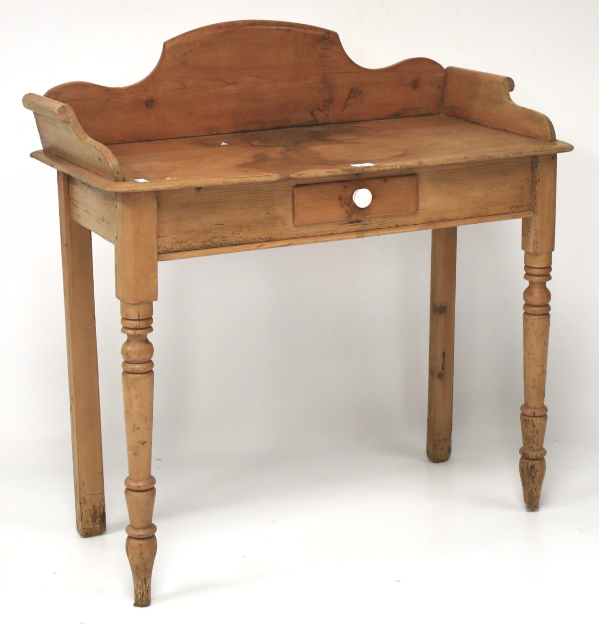 An early 20th century pine washstand.