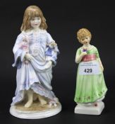 A Royal Worcester figurine 'LULLABY' H29cm and a Royal Doulton figurine 'Tess' HN 2865.