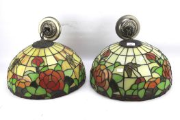 A pair of Tiffany style leaded glass ceiling lights.