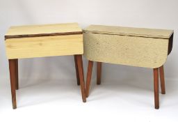 Two retro Formica drop-leaf tables.