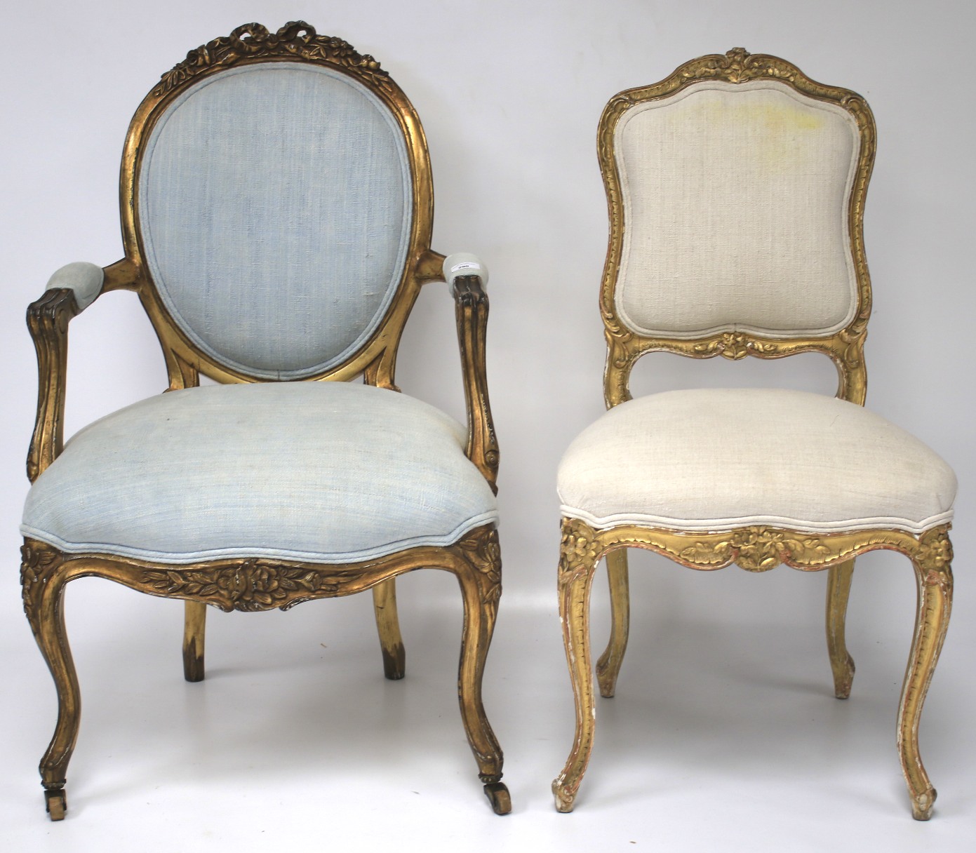 Two 20th century gilt upholstered chairs.