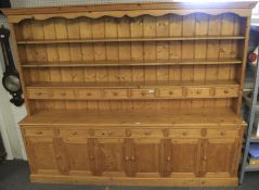 A large pine kitchen dresser.