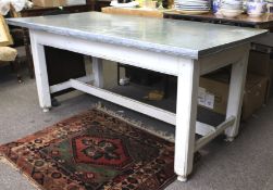 A 20th century industrial grey painted metal topped dining table.