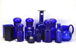 An assortment of blue glassware.