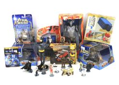 An assortment of toys and TV and film related collectables.