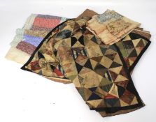 An early 20th century patchwork blanket together with a contemporary example.