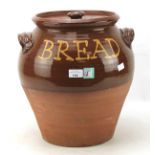 A stoneware twin handled lidded bread bin.