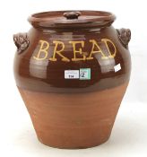 A stoneware twin handled lidded bread bin.