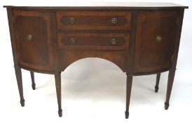 A contemporary mahogany veneer sideboard.