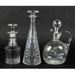 Three glass decanters.