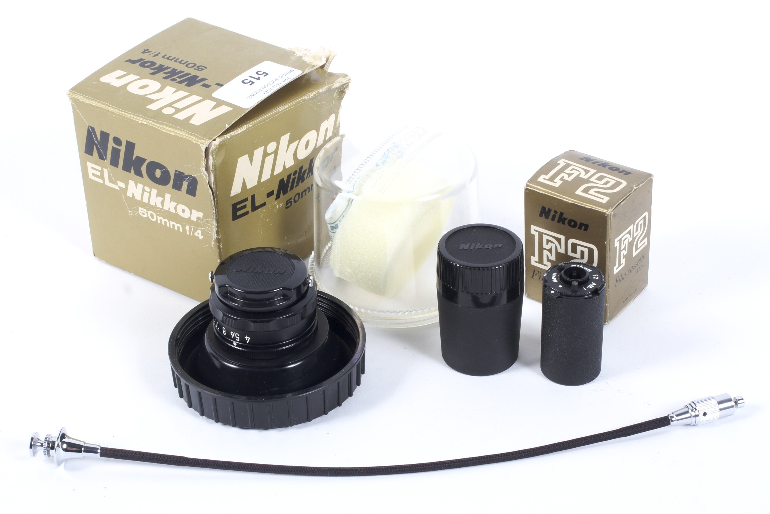 A Nikon EL-Nikkor 50mm f4 enlarger lens and accessories.