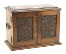 An early 20th century mahogany smokers cabinet.