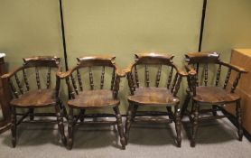 A set of four smokers bow chairs.