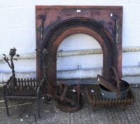 An assortment of cast iron fire surround items.