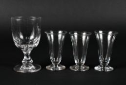 Three small ale drinking glasses and a medium sized rummer.