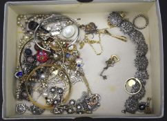 An assortment of costume jewellery. Including bangles, necklaces etc.