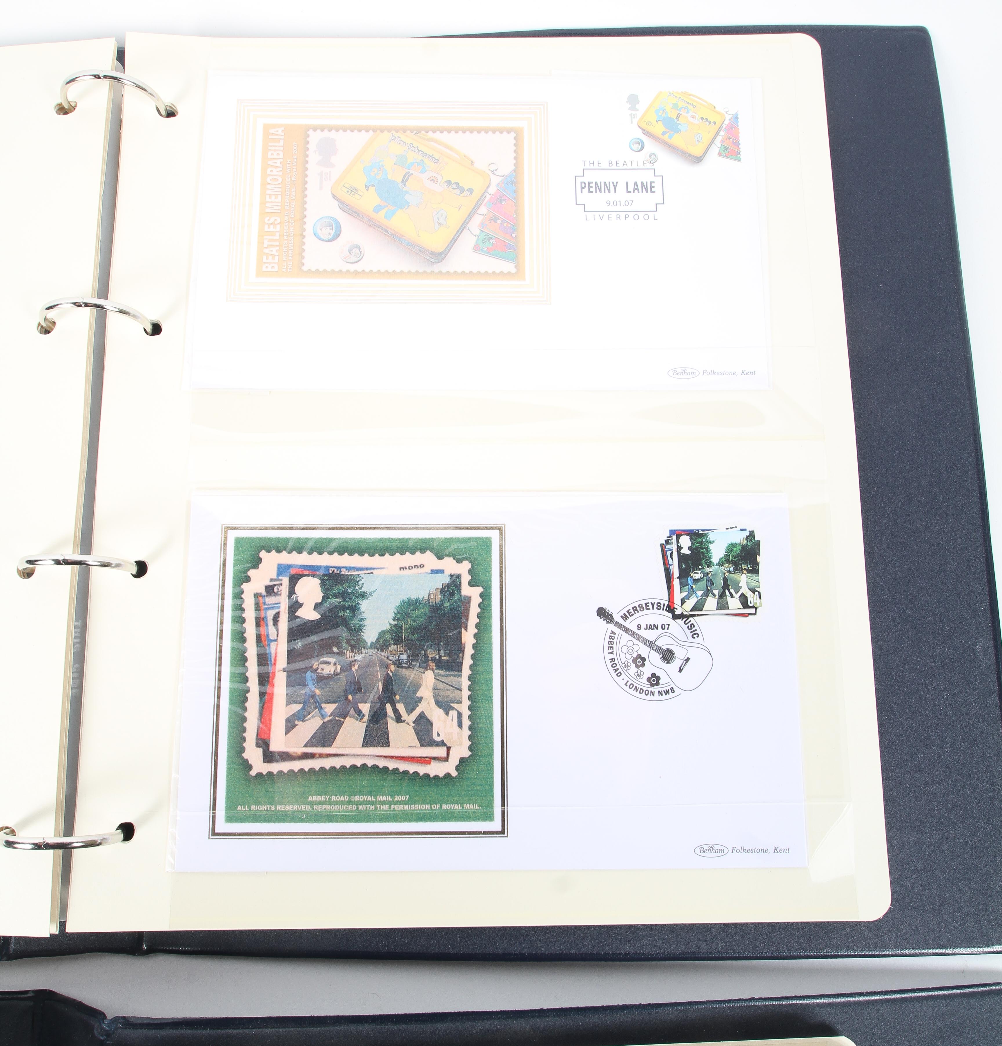 A folder containing the Spirit of the 60s Coin Cover set and a Beatles stamp cover set. - Image 2 of 3