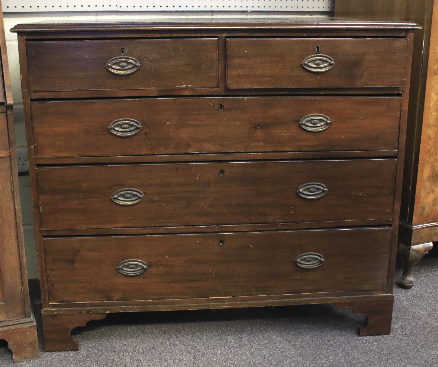A mahogany chest of two short over three long drawers.