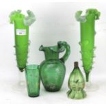 An assortment of green glassware.