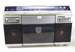 A vintage Sharp VZ-2000 disk stereo system. L73cm Condition Report: No cord present.