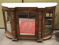 A 19th century burr walnut mirrored panel credenza with marble top.