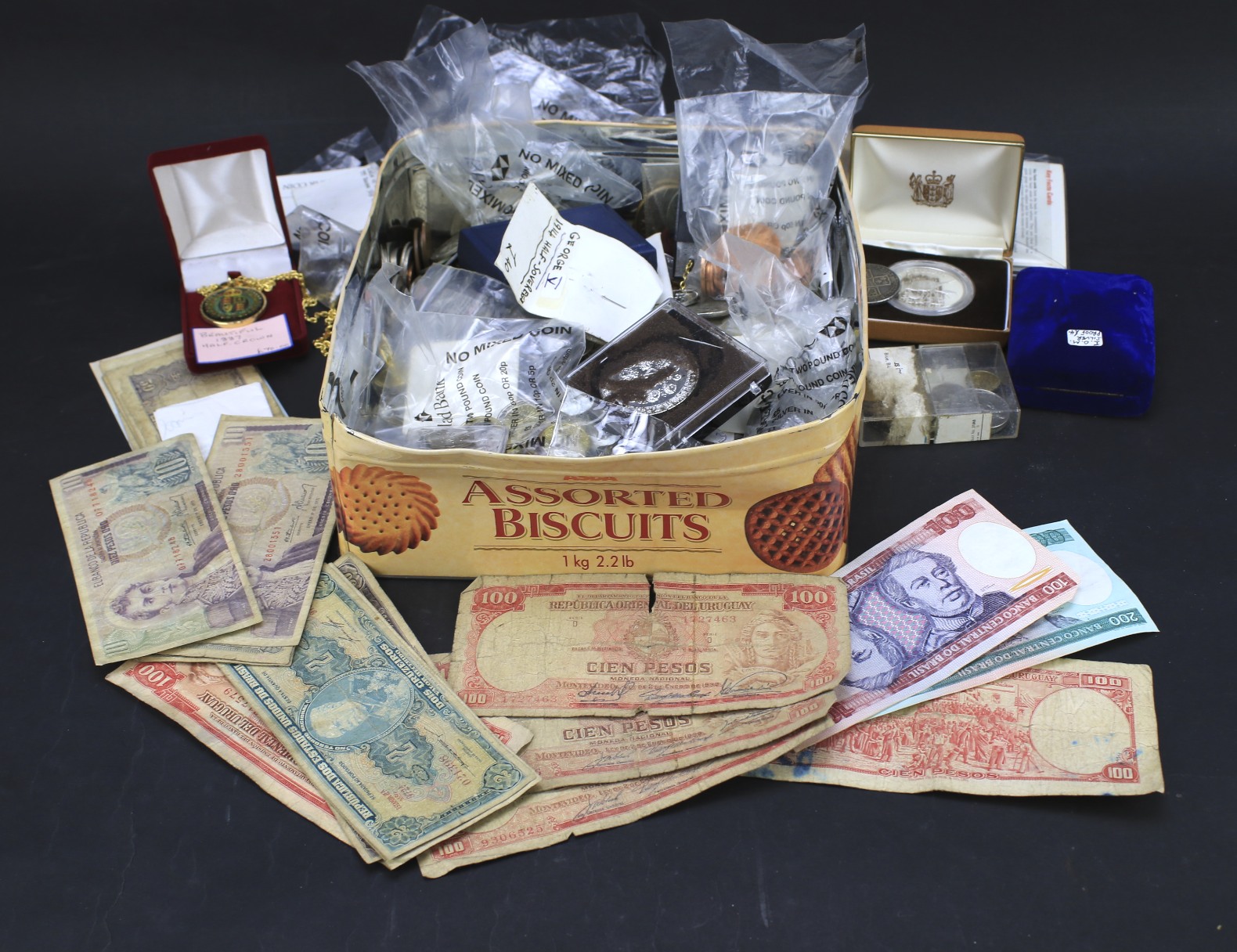 An extensive collection of assorted coins and notes.