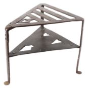 An Arts and Craft style early 20th century cast metal stand.
