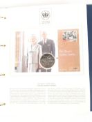 A folder containing The Queen's Golden Jubilee Coin Cover Collection.