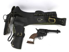 A Phoenix Arms Co replica flintlock and two holsters.