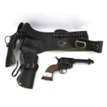 A Phoenix Arms Co replica flintlock and two holsters.