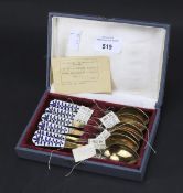 A set of six Russian silver gilt and enamel spoons.