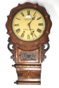 A late 19th century mahogany inlaid wall clock. Metal dial with Roman numerals marked 'T.