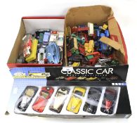 An assortment of diecast. featuring cars and commercial vehicles.