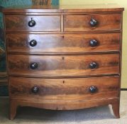 A 19th century flamed mahogany chest of two short over two long drawers.