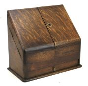 An early 20th century oak stationery box letter holder.