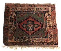 A hand woven Eastern rug.